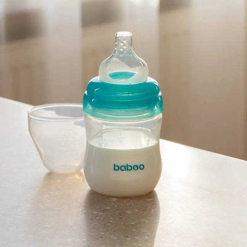 Baboo Handmilchpumpe mit 4 Saugstufen Klar/Türkis
