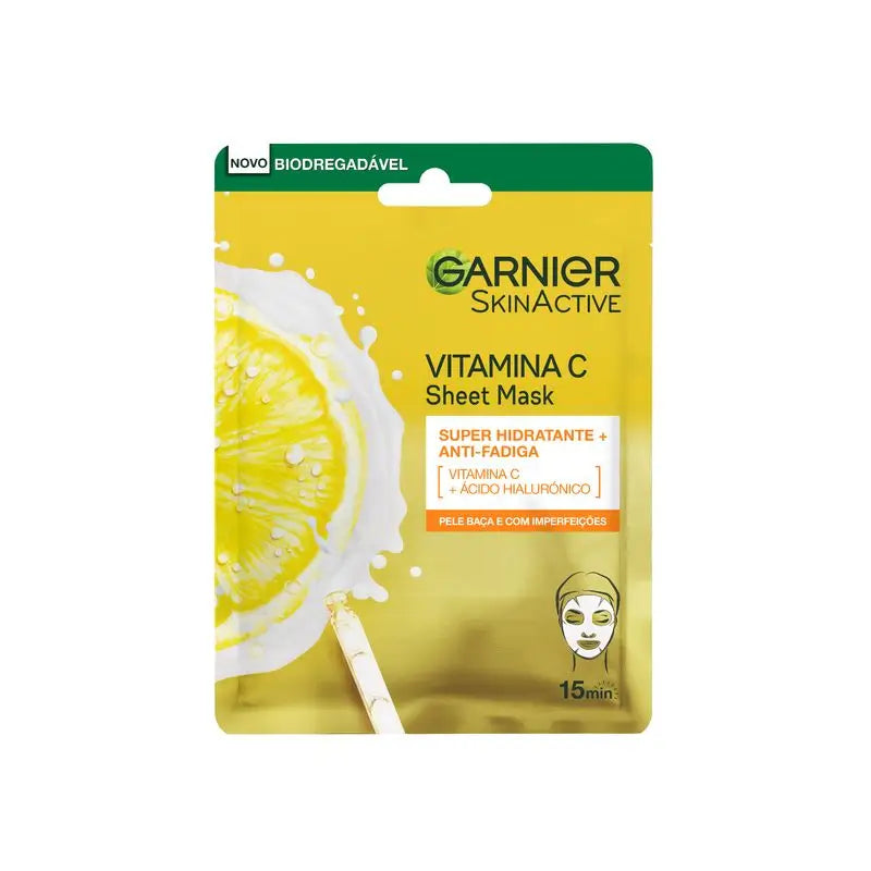 Garnier Tissue Gesichtsmaske mit Vitamin C und Hyaluronsäure. Intensiv mit Feuchtigkeit versorgte Haut und sichtbar mehr beleuchtet und glatter.